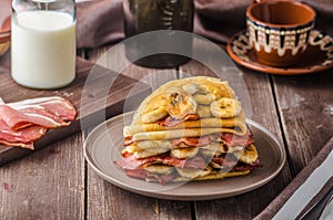 Pancakes with bacon, banana and maple sirup