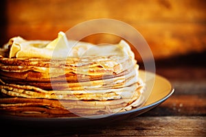 Pancakes with banana, nuts and honey. Traditional Russian cuisine. Maslenitsa. Dessert.