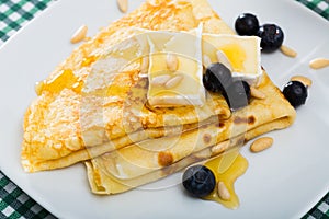 Pancakes with cheese brie and honey