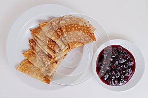 Pancakes and cherry jam for breakfast.