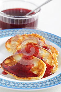 Pancakes with cranberry jam