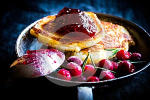 Pancakes with cranberry jam