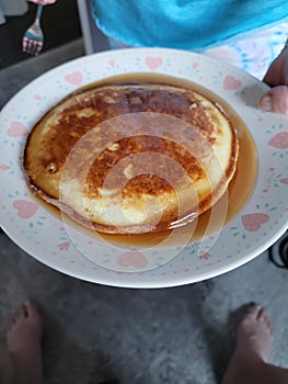 Pancakes drenched in syrup