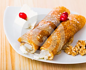 Pancakes with filling from brynza and walnuts, bulgarian dish palachinki