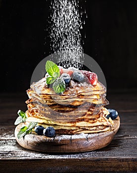 Pancakes with fresh berries photo