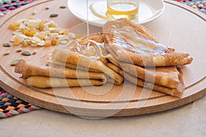 Pancakes, honey and nuts