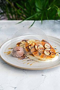 pancakes with ice cream and chocolate sauce