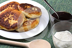 Pancakes with jam and sour cream