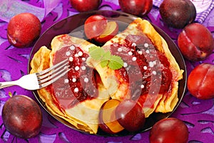 Pancakes with plum confiture