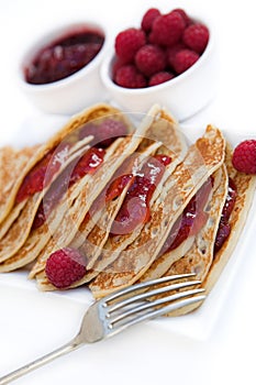 Pancakes with raspberry jam & fresh raspberries