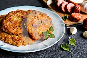 Pancakes with sour cabbage and sausage