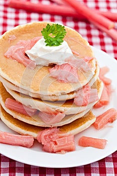 Pancakes with stewed rhubarb photo