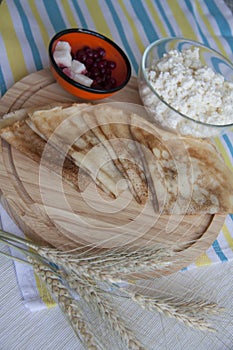 Pancakes on striped tablecloth