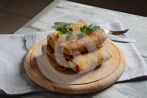 Pancakes stuffed with meat, herbs. Russian or Ukrainian cuisine