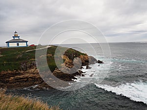 Pancha Island lighthouse, in Ribadeo, Lugo, Spain, Europe