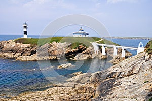 The Pancha island lighthouse (Spain) photo