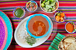 Pancita mondongo mexican soup varied chili sauces photo