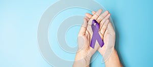 Pancreatic Cancer, world Alzheimer, epilepsy, lupus and domestic violence day Awareness month, Woman holding purple Ribbon for