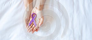 Pancreatic Cancer, world Alzheimer, epilepsy, lupus and domestic violence day Awareness month, Woman holding purple Ribbon for