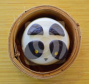 Panda Chinese bun in a Dimsum Bamboo Basket