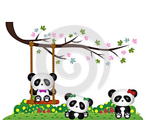 Panda playing under tree branches