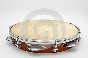 A pandeiro in front of white background