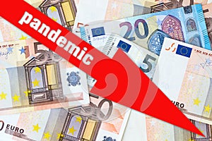 Pandemic. The financial decline of the economy. Red arrow on a background of Euro-banknotes. Business. Finance. Epidemic