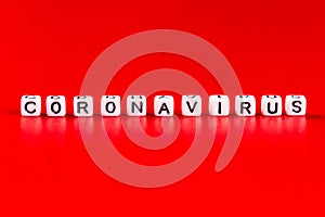 Pandemic and virus concept - Coronavirus word made of white blocks. Coronavirus text on red background.