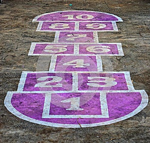 Pandi - Nondi - A Traditional Indian Hopscotch Game - Field with Blue Rubble - Fun, Leisure, and Kids Activity