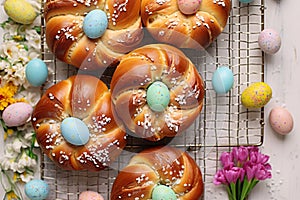 Top view of Pane di Pasqua, traditional Easter bread with easter eggs photo