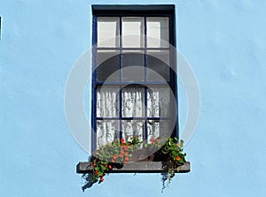 Paned Window In Blue Wall In Ireland