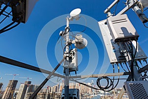 Panel antenna of GSM DCS UMTS LTE bands and radio unit are as part of communication equipment of basic station are