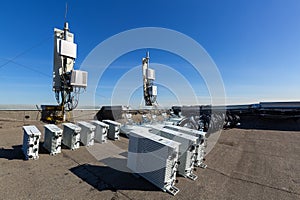 Panel antennas of GSM DCS UMTS LTE bands and outdoor radio units are as parts of communication equipment of basic