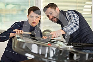 panel beating team in workshop