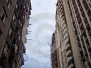 Panel house under construction. Building frame. Tall house under construction. The safety net is top notch. Industry. Photo from photo