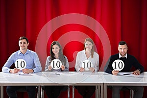 Panel Judges Holding 10 Score Signs