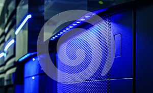 Panel mainframe closeup blue blur server room