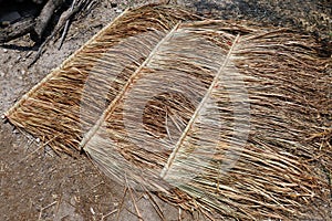 Panel of vetiver for hut roof, straw roof on ground, straw roof hut panel