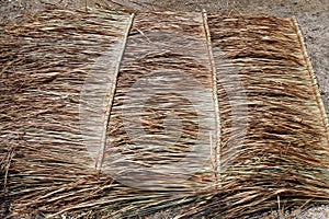 Panel of vetiver for hut roof, straw roof on ground, straw roof hut panel