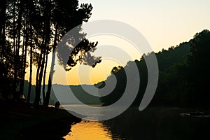 Pang oung lake and pine forest with sunrise in Mae Hong Son , Thailand