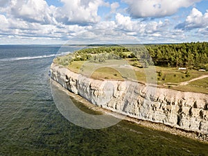 Panga coastal cliff Panga pank, north shore of Saaremaa island, near Kuressaare, Estonia. North-Estonian limestone escarpment, photo