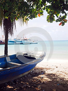 Panga fishing boat on shore Brig Bay Big Corn Island Nicaragua C