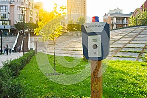 Panic alarm, police, emergency button in the public park.