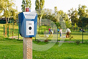 Panic alarm, police, emergency button in the public park.