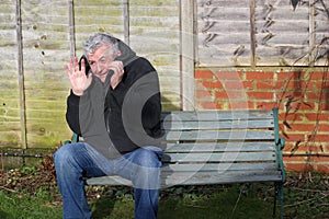 Panic attack man on a bench.