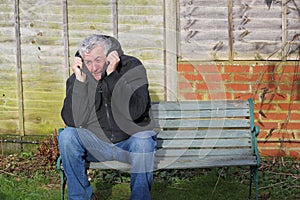 Panic attack man on a bench.