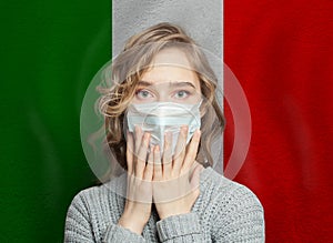 Panicking Italian woman in face mask against Italy flag. Flu epidemic and virus protection concept
