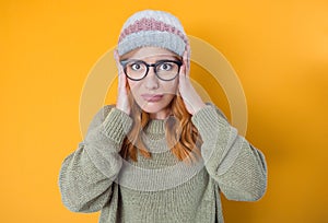 Panicking young woman stare to you, isolated on yellow background. Mistake. Bad news