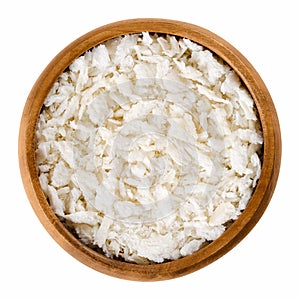 Panko flakes of bread crumbs in wooden bowl