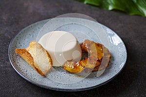 Panna cotta with caramelised pineapple and coconut biscuit